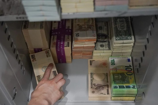 Various foreign currencies in a safe at an exchange office